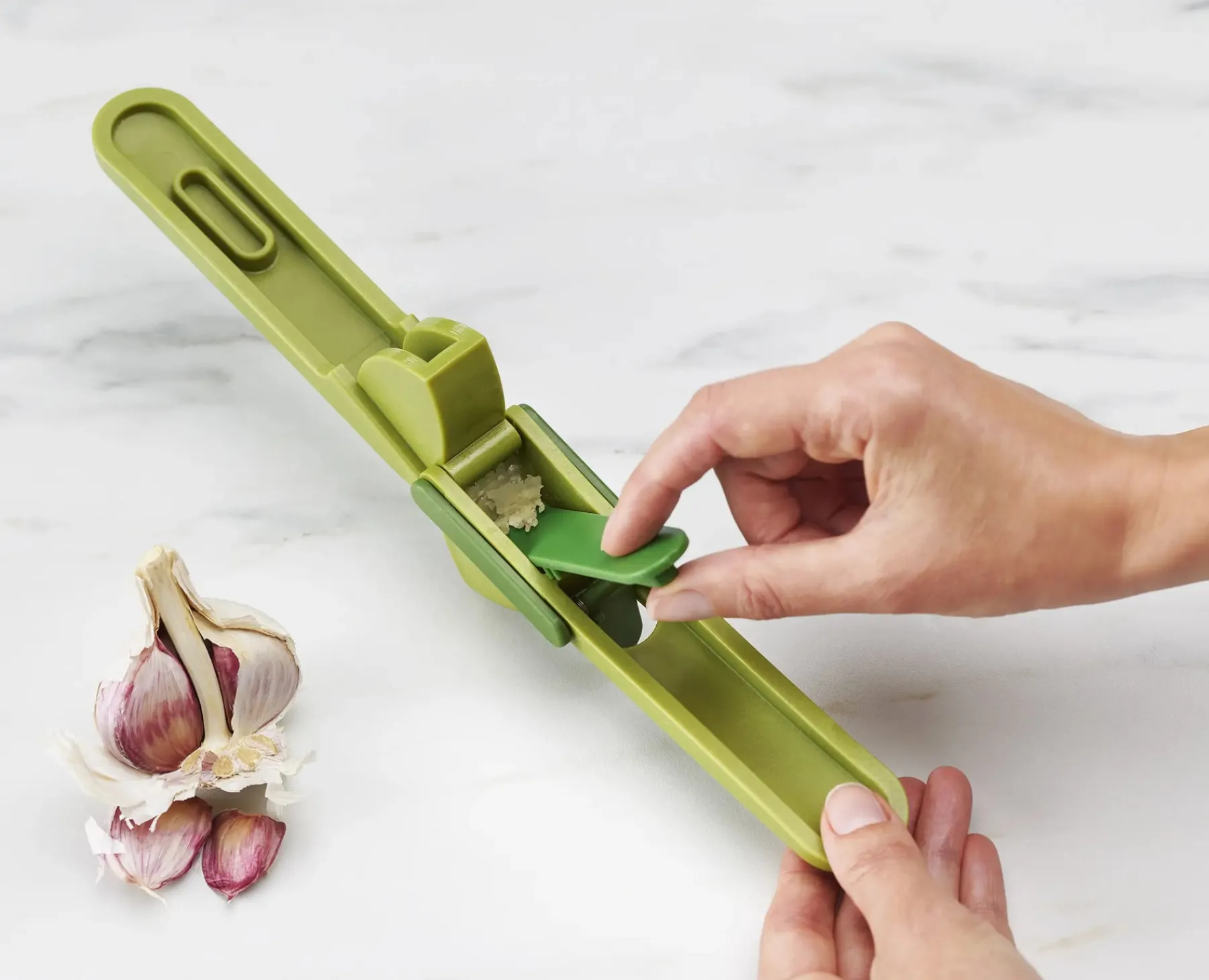 Kitchen Utensils & Gadgets-Joseph Joseph CleanForce™ Garlic Press Green