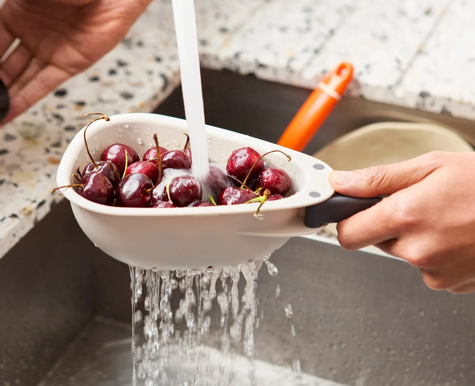 Colanders & Strainers-Joseph Joseph Droplet Mini White Colander with Folding Handle Stone