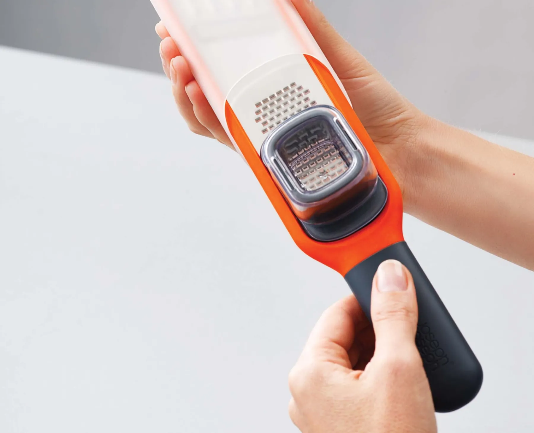Graters & Zesters-Joseph Joseph Handi-Grate™ 2-in-1 Mini Grater & Slicer Orange
