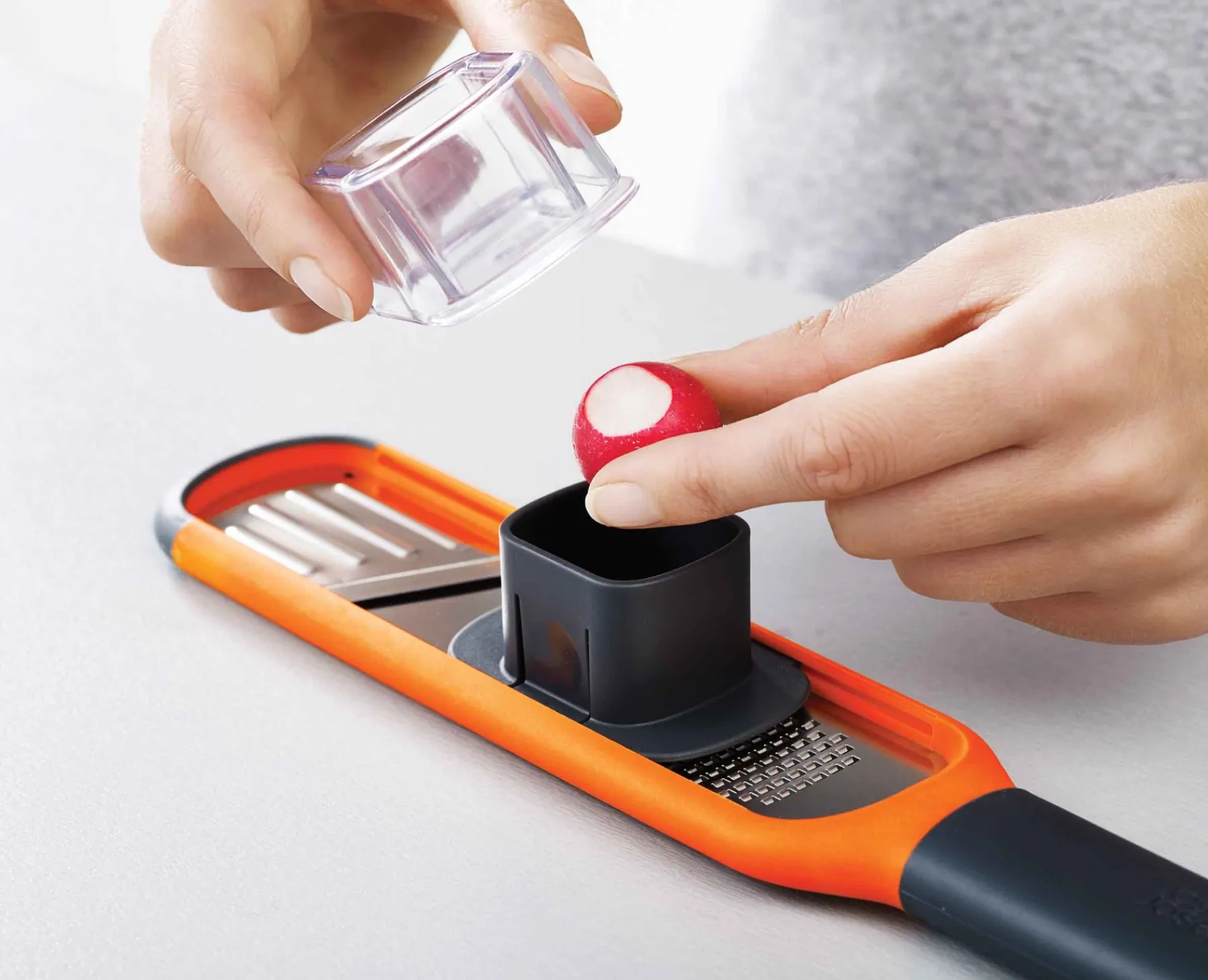 Graters & Zesters-Joseph Joseph Handi-Grate™ 2-in-1 Mini Grater & Slicer Orange