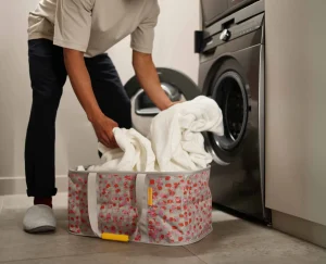 Laundry Baskets-Joseph Joseph Hold-All™ Collapsible 35L Laundry Basket Peach