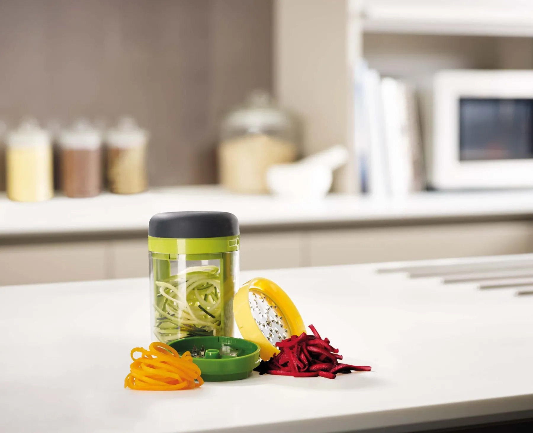 Kitchen Utensils & Gadgets-Joseph Joseph Spiro™ Hand-held Spiralizer Green